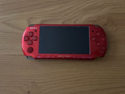 The PSP 3000 Red combines bold style with portable gaming power. Its sharp display, responsive controls, and impressive media feature...