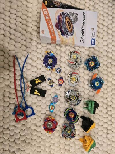 beyblade plastic gen in bulk,  some purin bags and a pokemon figurine. everything was packaged nicely and delivered fast!