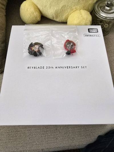 finally my beyblade x anniversary set arrived along with a blk metal coat dragoon. everything looks secured and items is in great con...