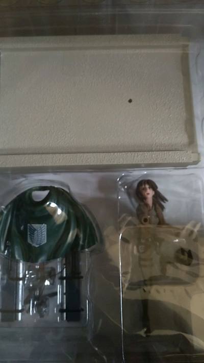 it took a while, but the package made it here in one piece. its not in its original package,  but the figure is here.