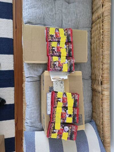 Product was listed as 2 sealed Boxes but shipped as two boxes worth of loose packs.