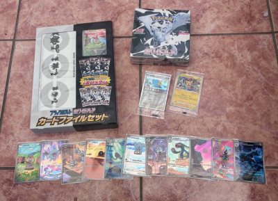 I got a few bit including white flare booster box and a victini binder set was over the moon with the pulls. it arrived fast and well...