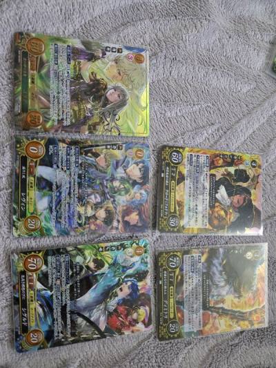 My eight order from doorzo, many fire emblem cipher card and a one piece op12 booster box all in good condition.