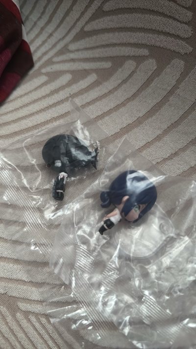 Mixed orders of K-Pop Photocards and Anime Gashapons