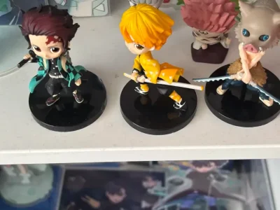 I bought my self 18 qposkets from the hit show demon slayer! I bought 3 tanjiros, 2 inosukes , 3 zenitsus, 2 obanais. mitsuri, shinob...